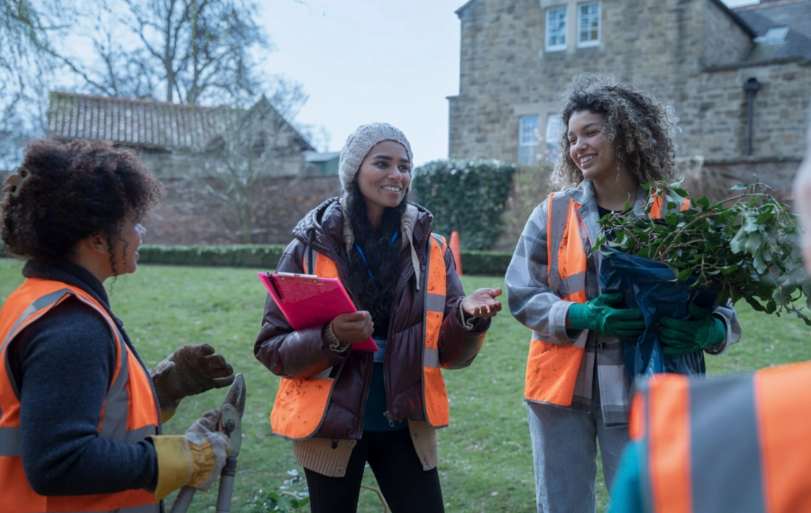 Community volunteers working together outdoors